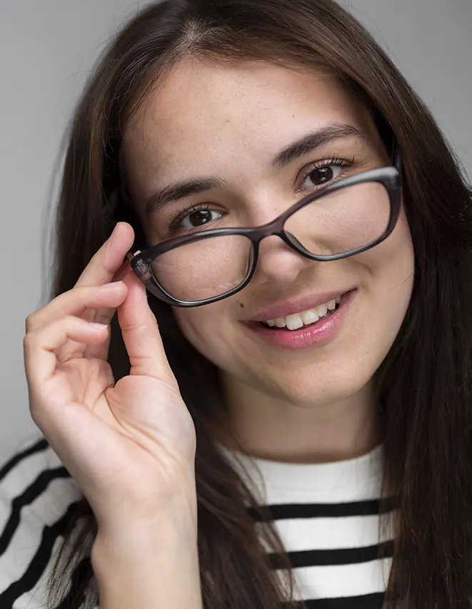 Woman in glasses by Freepik